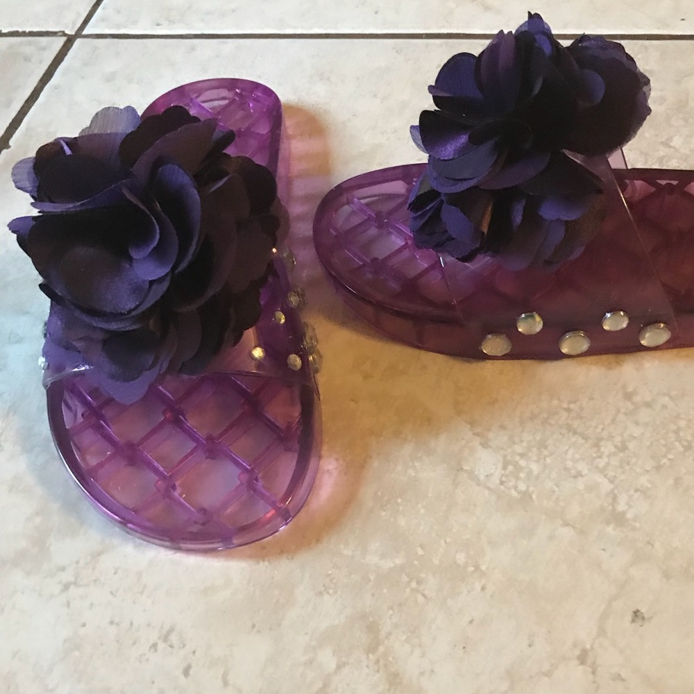 Purple slides made with a bow and studs